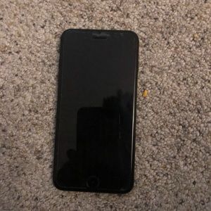 Black iPhone 7+ with screen protector